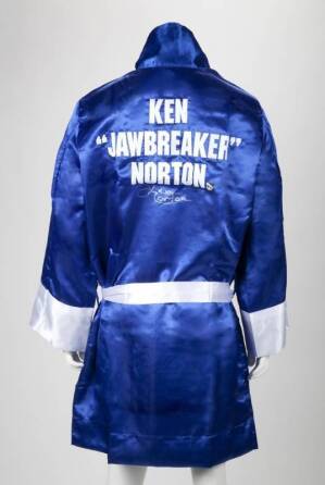 KEN NORTON SIGNED BOXING GLOVE, ROBE AND TRUNKS