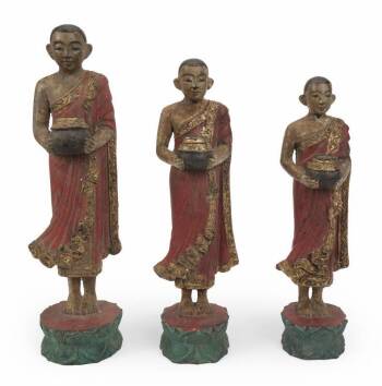 GROUP OF THAI PAINTED AND GILTWOOD STATUES