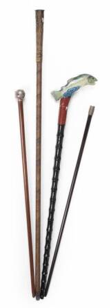 GROUP OF FOUR DECORATIVE CANES