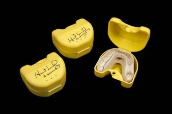 EVANDER HOLYFIELD TRAINING USED & SIGNED MOUTH GUARDS