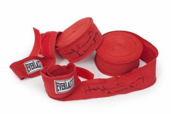 EVANDER HOLYFIELD OWNED AND SIGNED EVERLAST HAND WRAPS