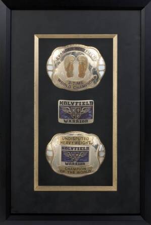 EVANDER HOLYFIELD FRAMED CHAMPIONSHIP BELT BUCKLES