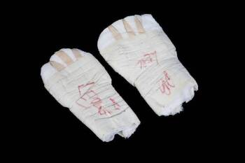 EVANDER HOLYFIELD VS. MICHAEL MOORER II FIGHT WORN HAND WRAPS