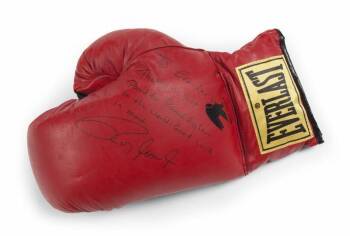 ROY JONES JR. SIGNED GLOVE TO EVANDER HOLYFIELD