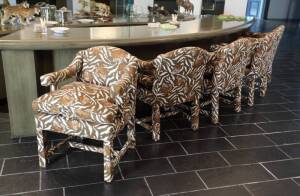 GROUP OF FIVE UPHOLSTERED ARMCHAIRS