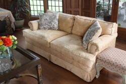 PAIR OF UPHOLSTERED LOVESEAT SOFAS