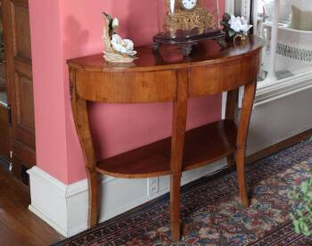 PAIR OF CARVED SIDE CHAIRS AND AN ANTIQUE DEMILUNE