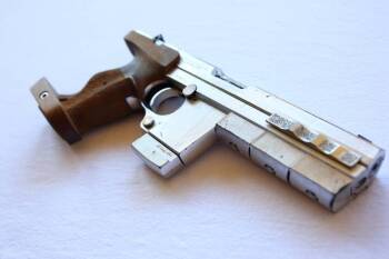 HERO CUSTOM CHROMED PISTOL USED BY BRIDGET FONDA IN POINT OF NO RETURN