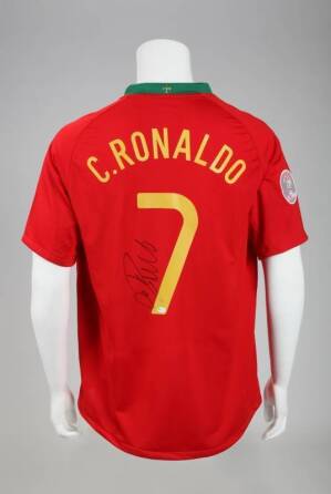CRISTIANO RONALDO SIGNED PORTUGAL JERSEY AND SIGNED SOCCER CLEAT