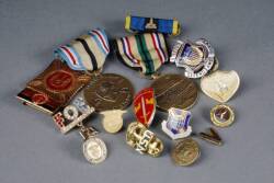 COLLECTION OF MILITARY PINS AND MEDALS