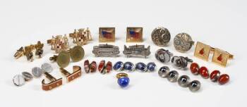 AN ASSORTED GROUP OF CUFF LINKS