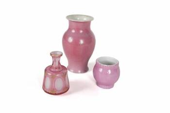 GRETA GARBO GROUP OF THREE PINK AND WHITE VASES