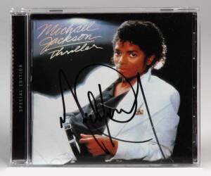 MICHAEL JACKSON SIGNED THRILLER COMPACT DISC