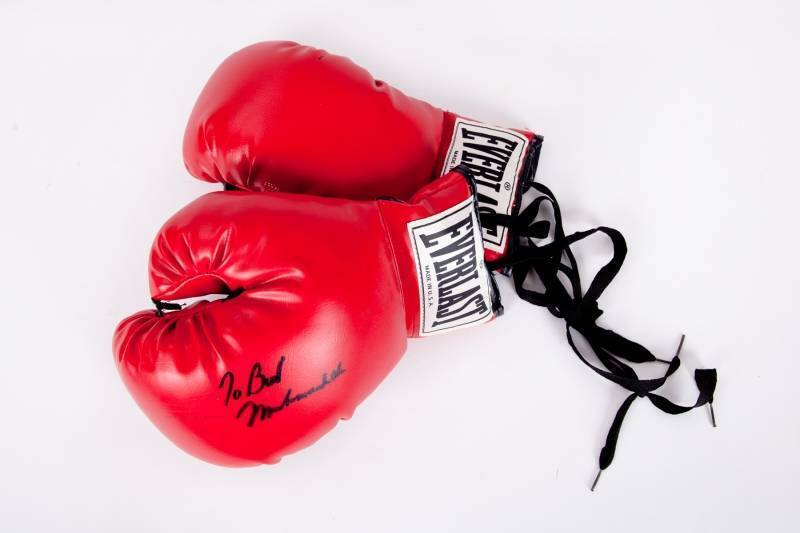 MUHAMMAD ALI SIGNED BOXING GLOVE TO BURT REYNOLDS