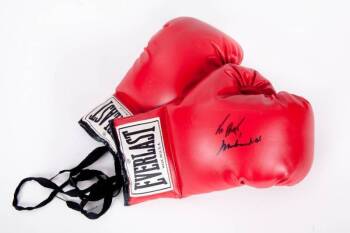 MUHAMMAD ALI SIGNED BOXING GLOVE TO BURT REYNOLDS