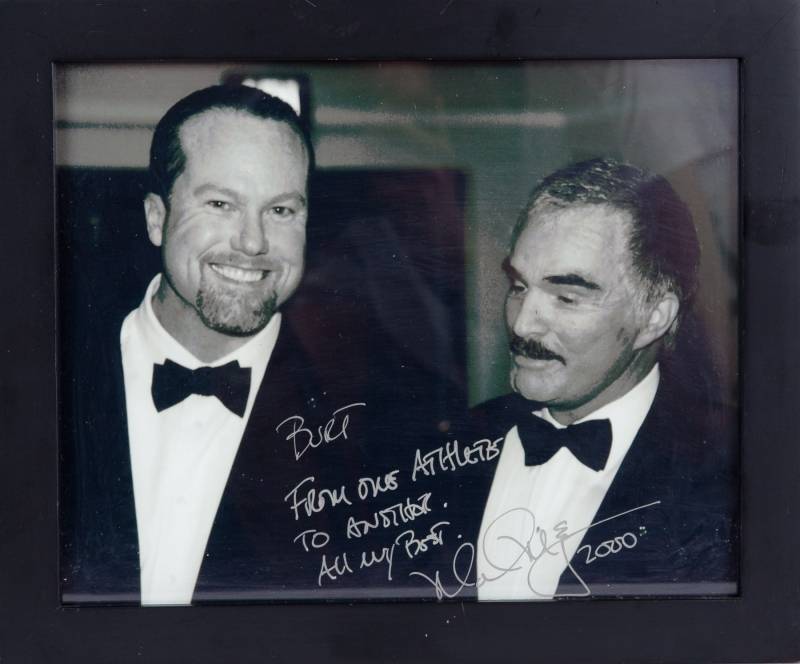 MARK McGWIRE SIGNED AND INSCRIBED PHOTOGRAPH TO BURT REYNOLDS