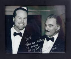 MARK McGWIRE SIGNED AND INSCRIBED PHOTOGRAPH TO BURT REYNOLDS