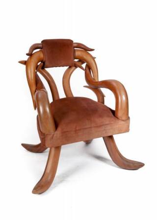 BURT REYNOLDS CARVED WOOD "HORN" CHAIR