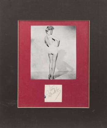 BETTY GRABLE SIGNED CUT SHEET