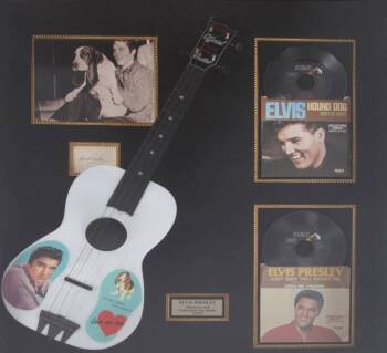 ELVIS PRESLEY SIGNED CUT SHEET AND 1956 TOY GUITAR DISPLAY