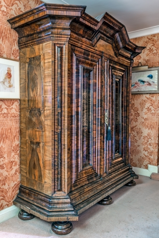 GERMAN 18TH CENTURY WALNUT WELLENSCHRANK