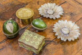 LUISE RAINER GROUP OF BRONZE AND GREEN TABLE ITEMS