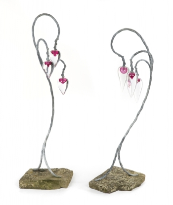 PAIR OF ORNAMENTAL GLASS SCULPTURES