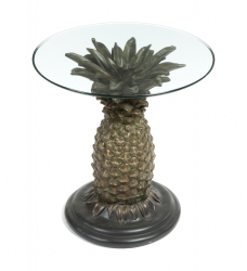 JOAN COLLINS PINEAPPLE TABLE AND POTTERY AND STONE CAMELS