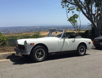 JOAN COLLINS 1973 MG MIDGET MARK III ROADSTER