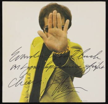 ELTON JOHN INSCRIBED LINER NOTES TO EVANDER HOLYFIELD