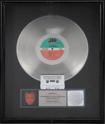 PHIL COLLINS "PLATINUM" RECORD AWARD