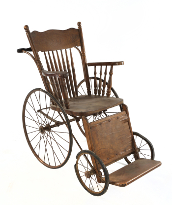 JANE WITHERS ANTIQUE WHEELCHAIR
