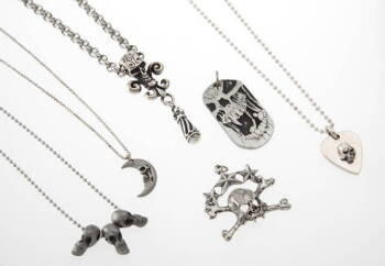 GROUP TWO OF SKULL FORM AND GUITAR PICK JEWELRY