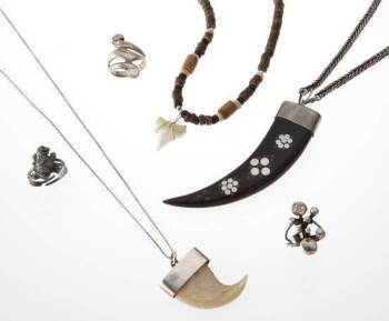GROUP OF SHARK TOOTH THEMED JEWELRY