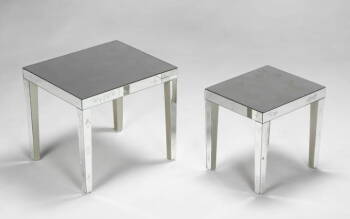 TWO MIRRORED NESTING TABLES