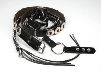 SLASH WORN GROUP OF THREE LEATHER AND METAL BELTS