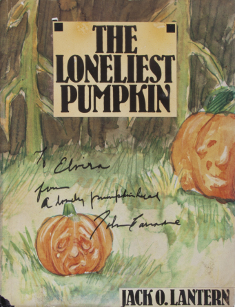 ELVIRA SCREEN-MATCHED, JOHN CARRADINE SIGNED "LONELIEST PUMPKIN" BOOK FROM "MOVIE MACABRE" AND "ELVIRA'S MTV HALLOWEEN PARTY"