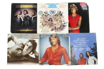 OLIVIA NEWTON-JOHN THE BEE GEES AND ANDY GIBB COLLECTION OF ALBUMS, INCLUDES ONE INSCRIBED BY NEWTON-JOHN