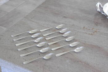 SET OF TWELVE CARTIER STERLING TEASPOONS