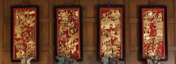 A CHINESE FOUR PANEL SCREEN AND FOUR MATCHING WALL PANELS
