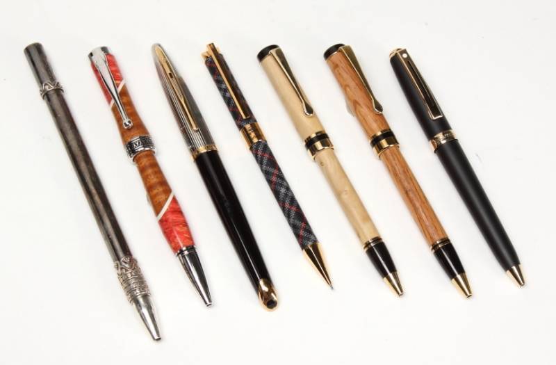 GROUP OF FIVE BALLPOINT PENS