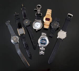 GROUP OF EIGHT METAL WRISTWATCHES