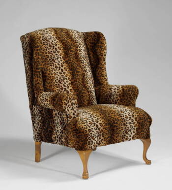 A CUSTOM LEOPARD WINGBACK ARMCHAIR AND SEAT BENCH