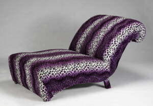 A CUSTOM PURPLE LEOPARD UPHOLSTERED SOFA AND CHAISE LOUNGE WITH OTTOMAN