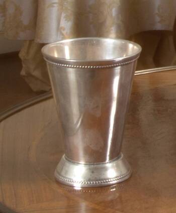 TWO SILVER METAL CUPS