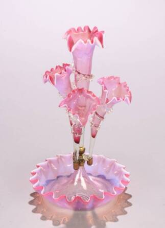 A CRANBERRY CASED AND OPALESCENT GLASS EPERGNE