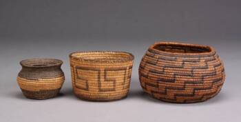 A GROUP OF THREE NATIVE AMERICAN WOVEN BASKETS