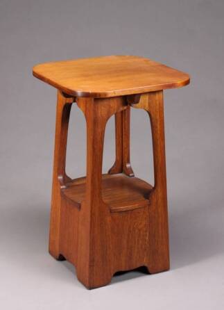 A CHARLES LIMBERT OAK SIDE TABLE