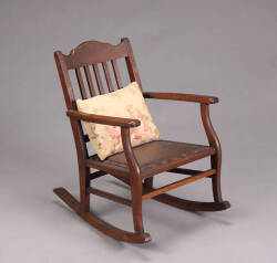 AN ARTS AND CRAFTS CHILD’S ROCKER