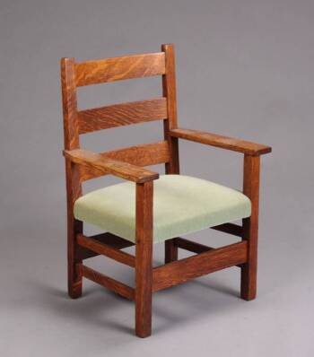 A GUSTAV STICKLEY CHILD’S CHAIR